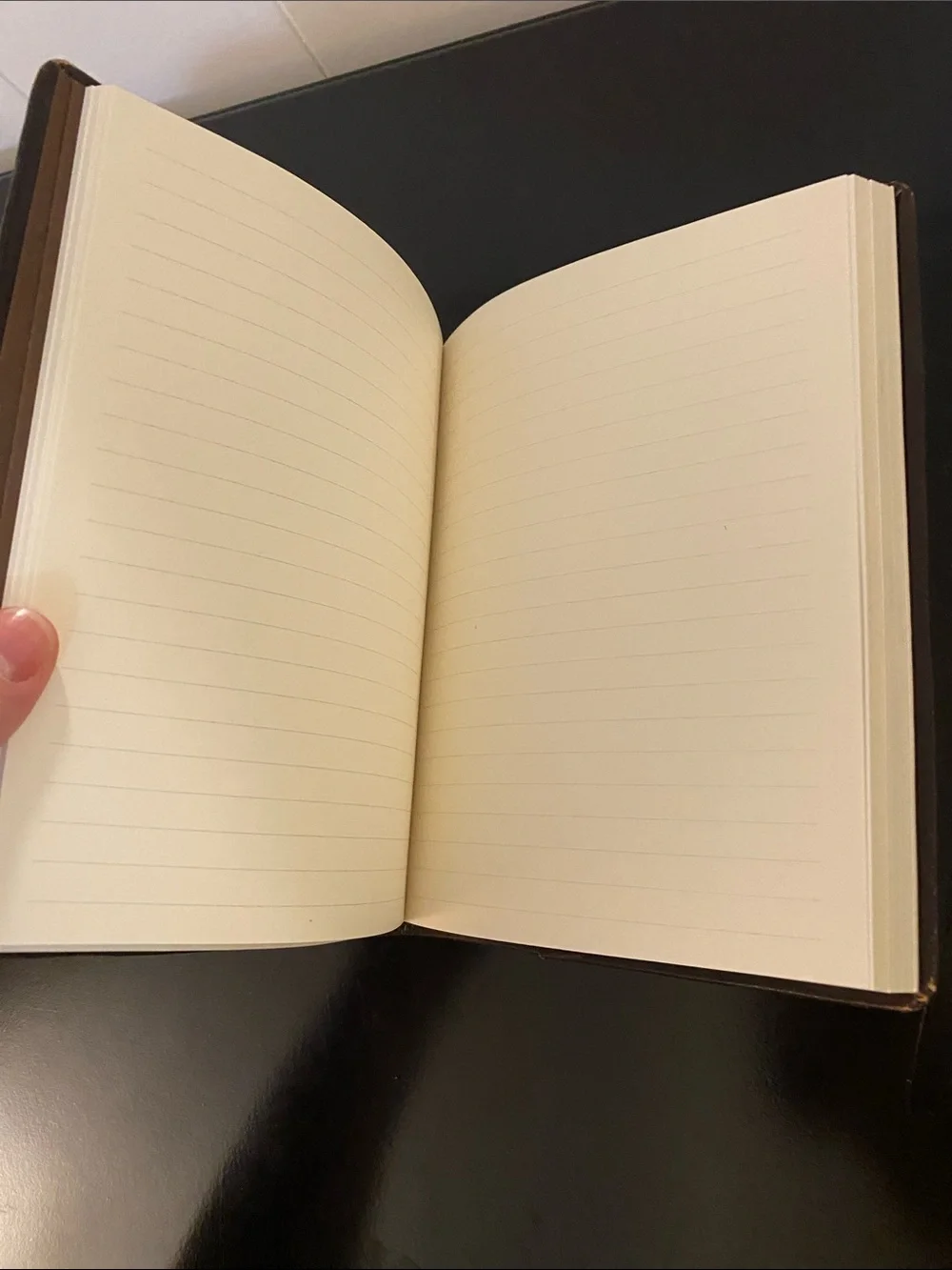 Embossed brown faux leather journal